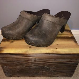 Distressed brown cloggs